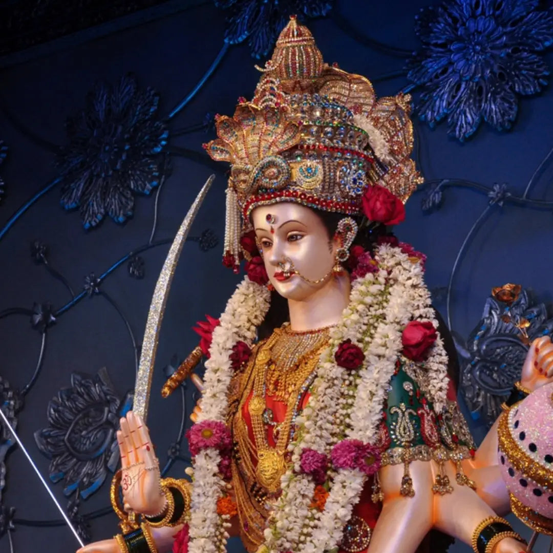 Ornately adorned statue of Goddess Durga represents Navratri celebrations and symbolic return gifts