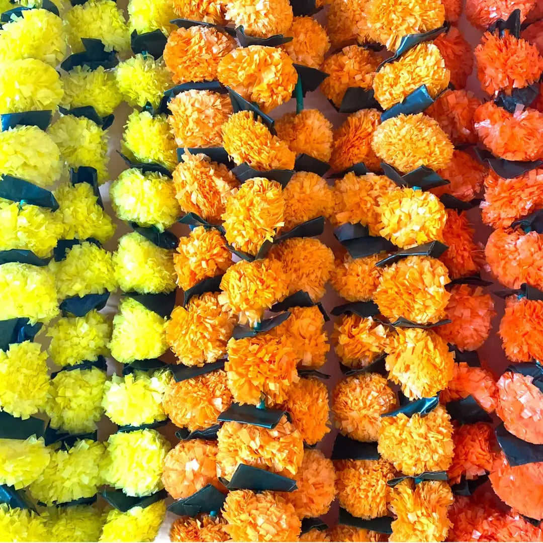 Colorful array of marigold flowers in vibrant hues, a symbol steeped in culture