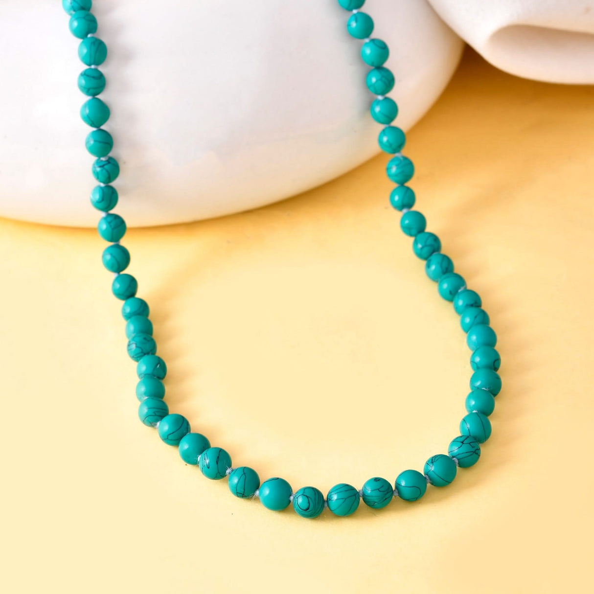 Vibrant turquoise beaded necklace with natural veining from LOVENSPIRE Mala Jewelry