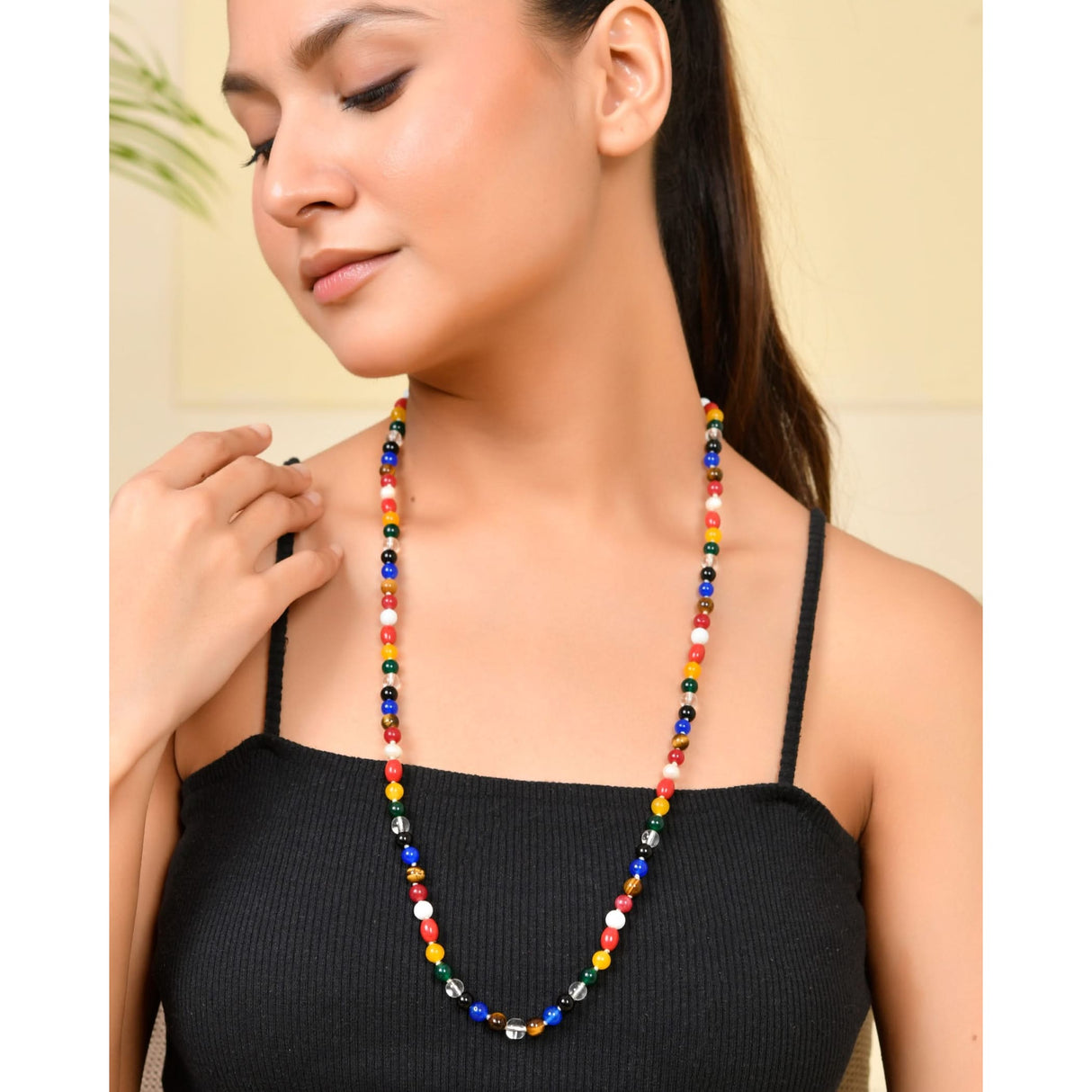 Colorful beaded necklace featuring natural healing crystal gemstones for yoga and meditation