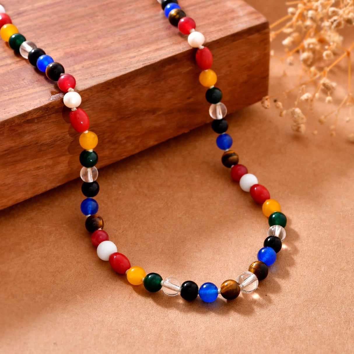 Colorful beaded necklace with natural healing crystal gemstones for yoga and meditation