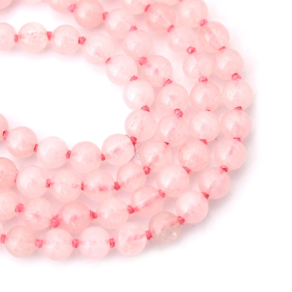 Pink beaded necklace made of natural healing crystals for yoga meditation and chakra balancing