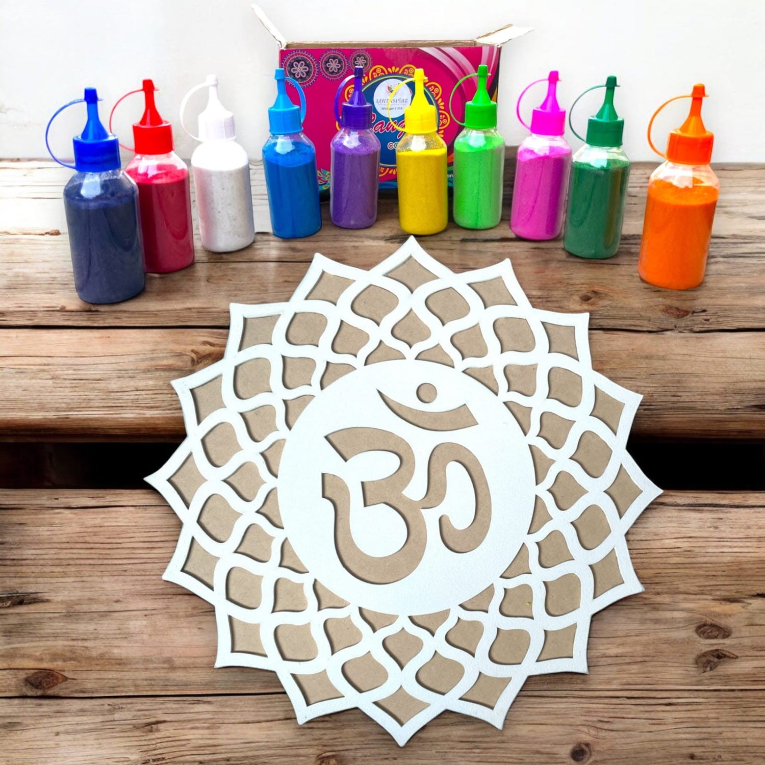 Colorfully bottled paint set with Om symbol mandala for Diwali Navratri decoration