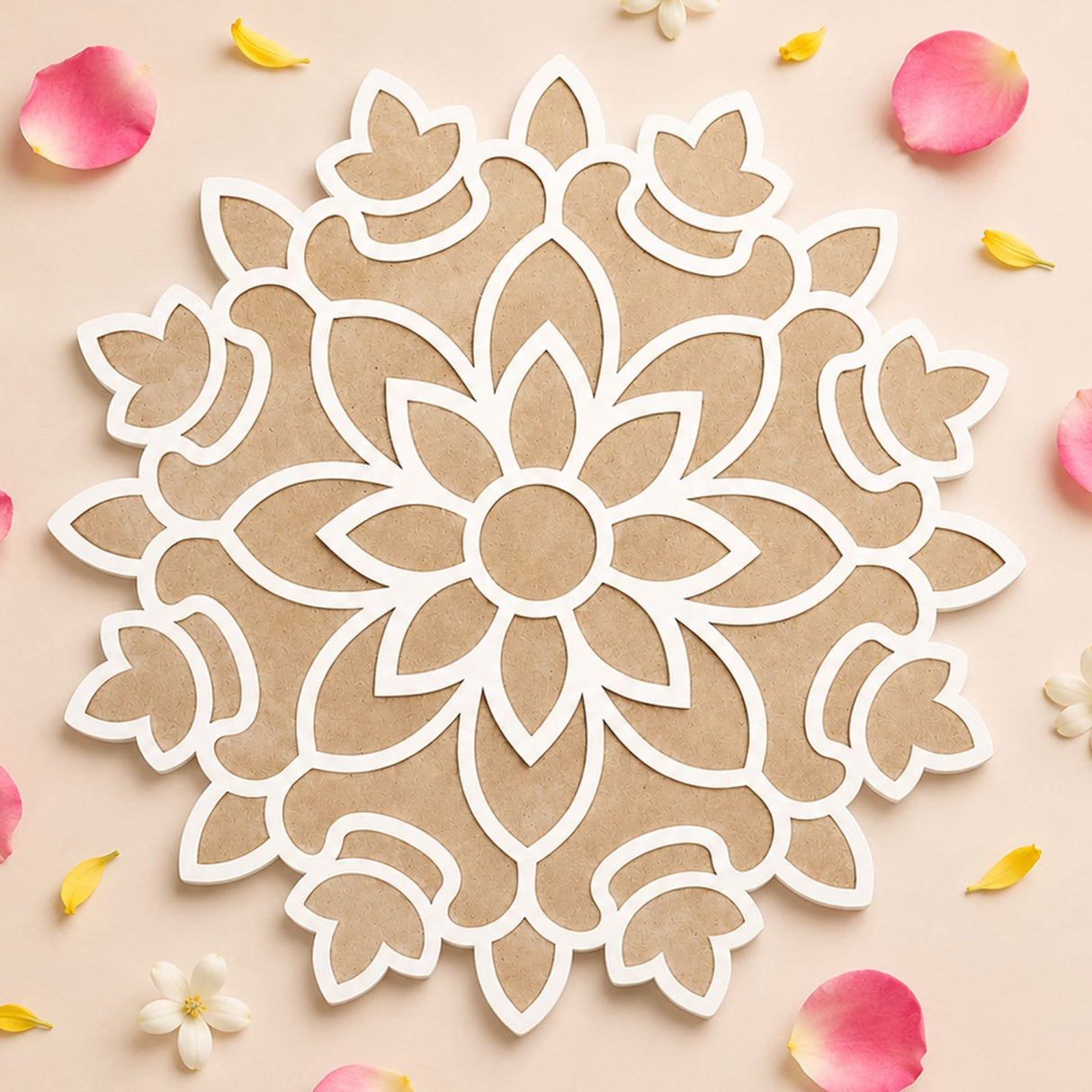 A delicate white laser-cut mandala design on a beige mdf rangoli mat with pink and yellow flower petals