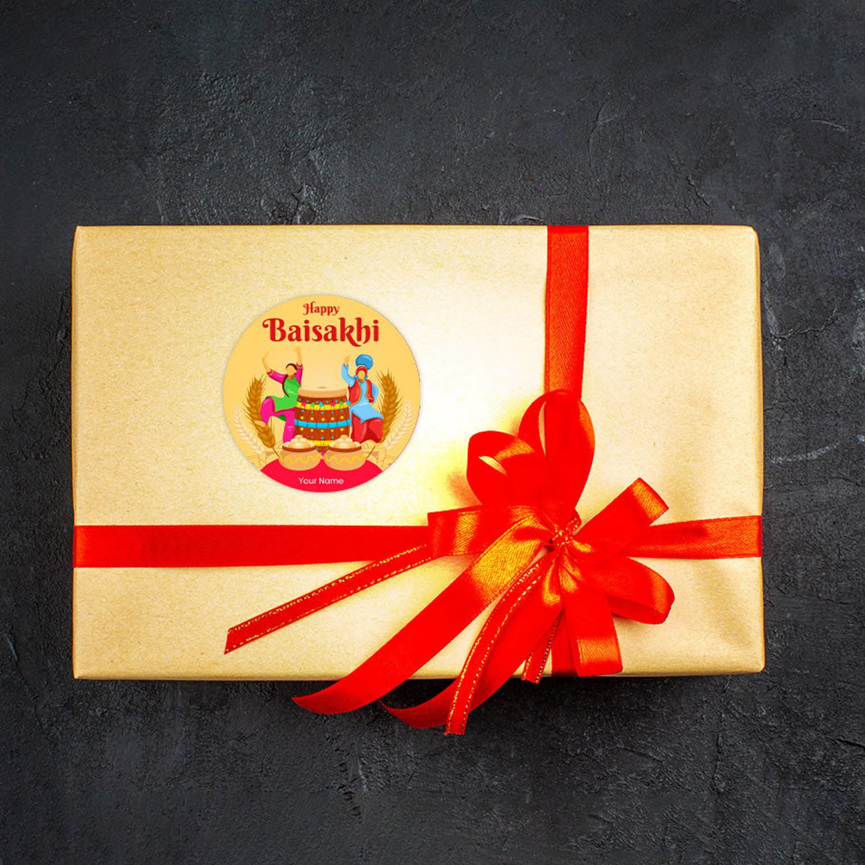 Gold gift box with red ribbon and Baisakhi sticker for Hindu Festival celebration