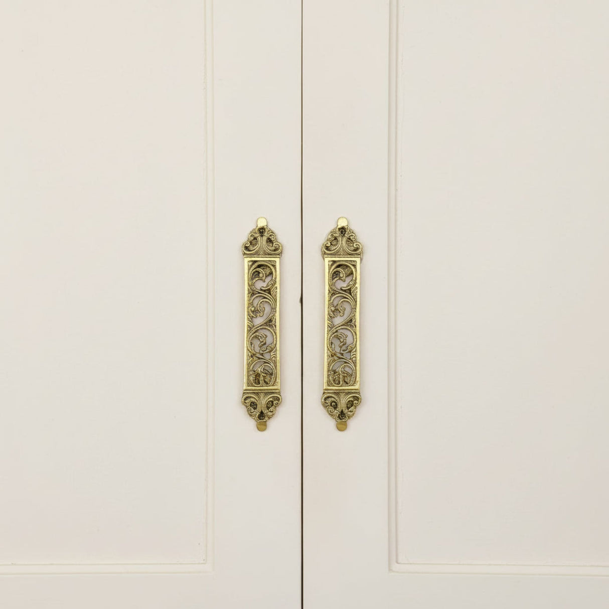 Gold-toned ornate brass cabinet handles with scrollwork, 11.7-inch pair