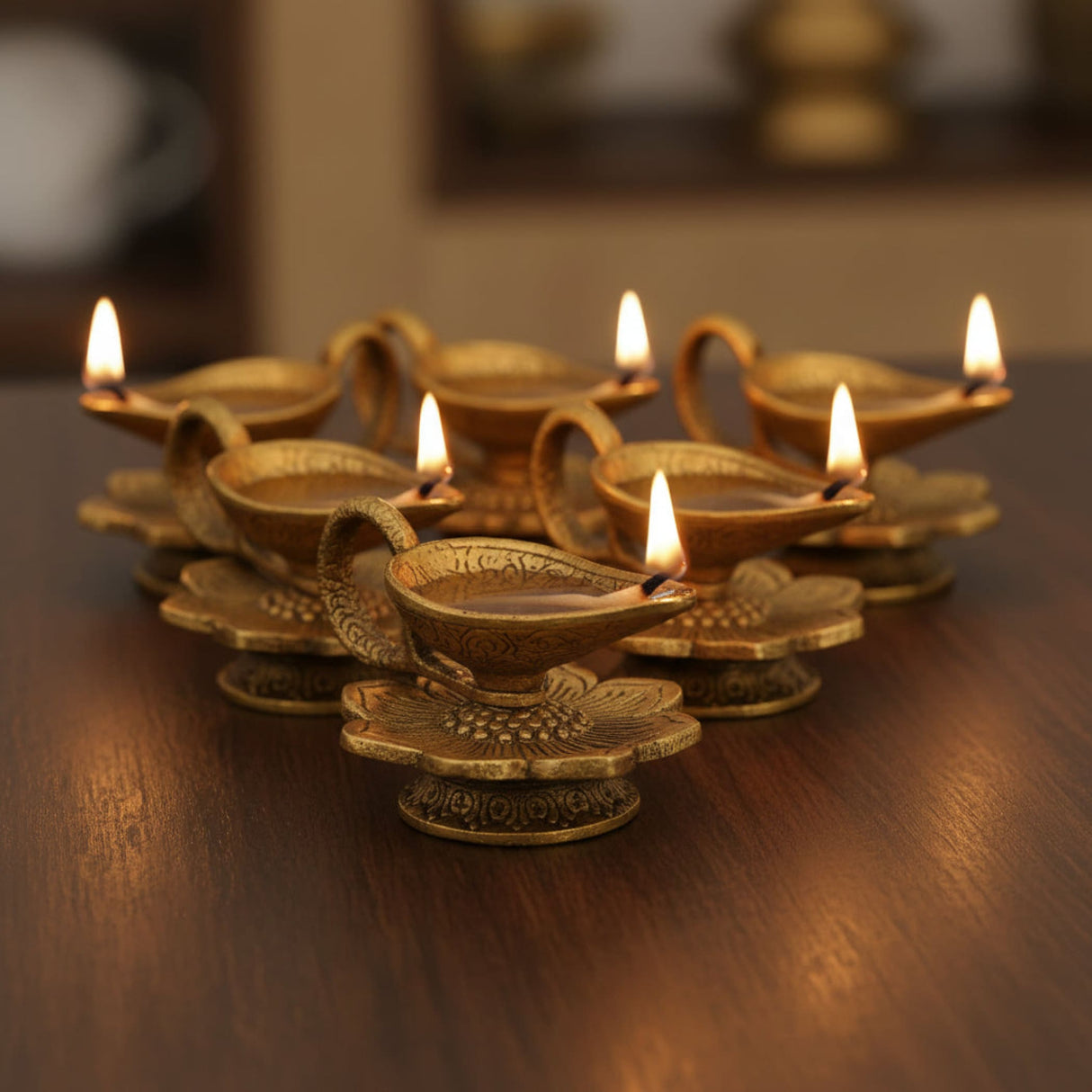Lotus brass finish diya oil lamps with floral engravings for Diwali pooja