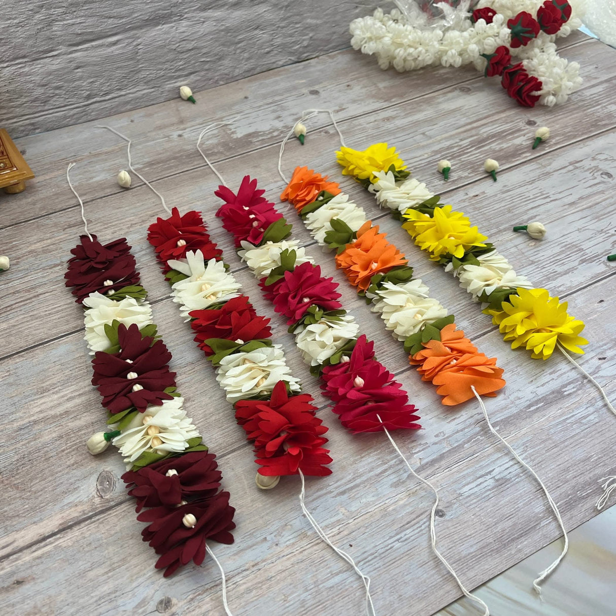 Colorful floral garlands for bridal hair accessories and traditional Indian jewelry