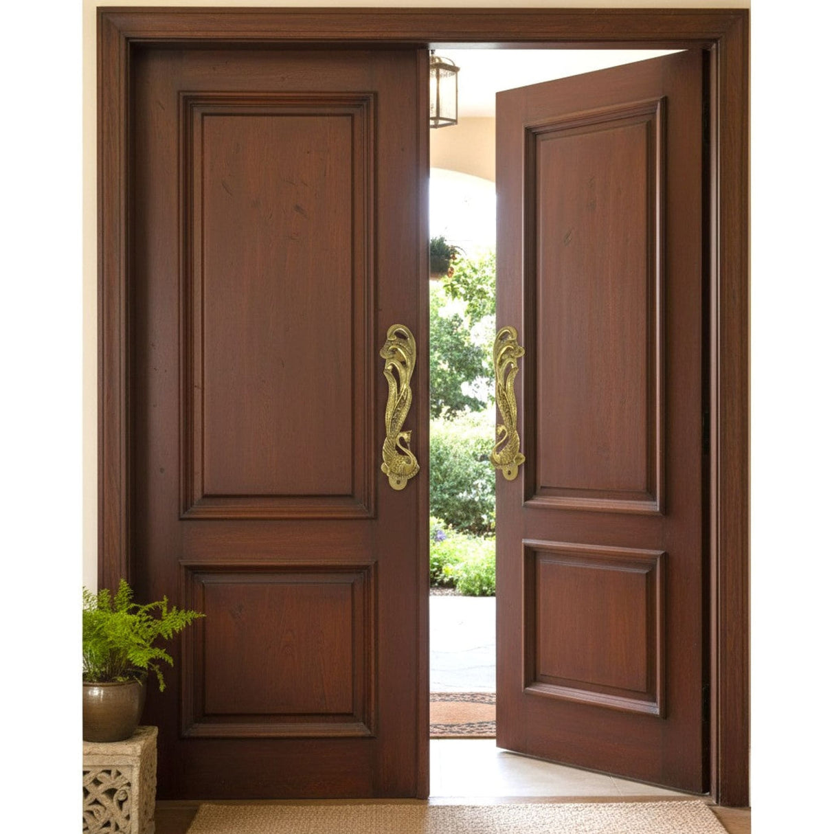 Dark brown wooden double doors with ornate gold peacock handles