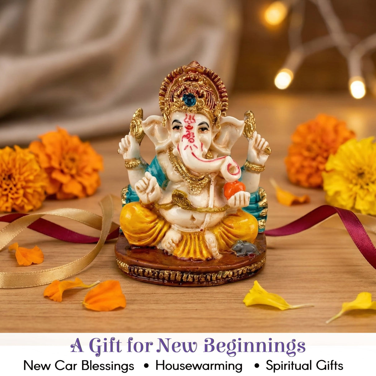 Detailed multi-colored 2.25-inch acrylic Ganesha figurine with gold accents, blue gem