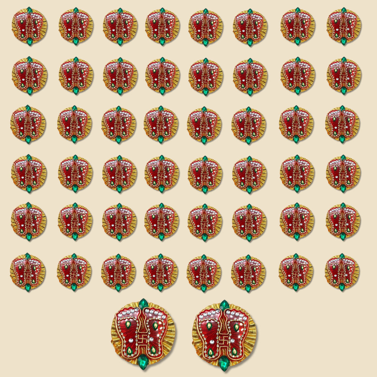 Acrylic lakshmi charan paduka red and gold embroidered foot-shaped decorative patches with green gemstones for diwali decor