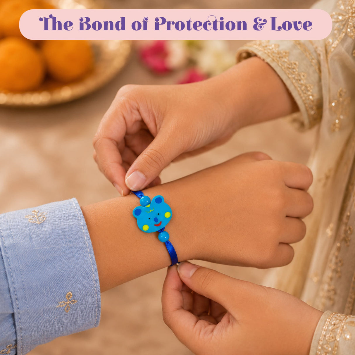 Animal theme rakhi for brother featuring a bright blue bear-shaped charm with yellow polka dots on an adjustable thread