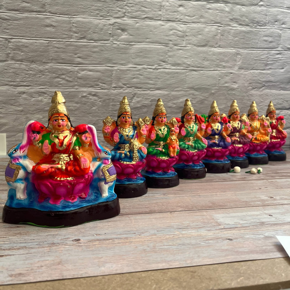 Colorful Lakshmi figurines from the Goddess Ashtalakshmi Set for Navratri Golu Dolls