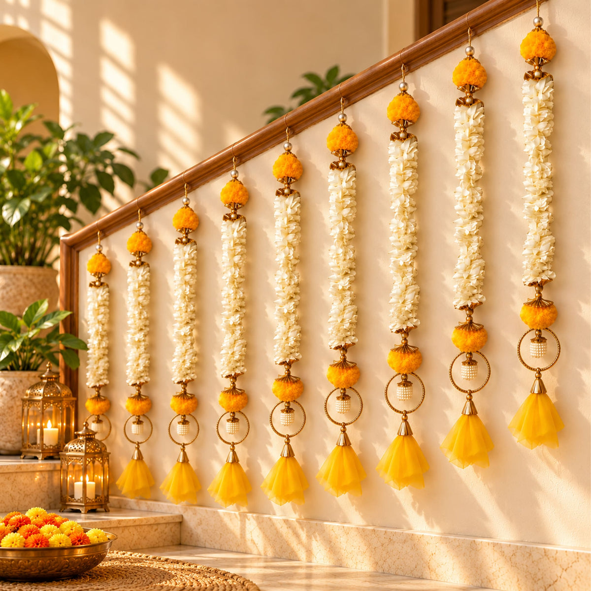Bangle pom pom hanging backdrop garland with golden ornamental garlands white jasmine flowers and orange pom-poms for festive décor