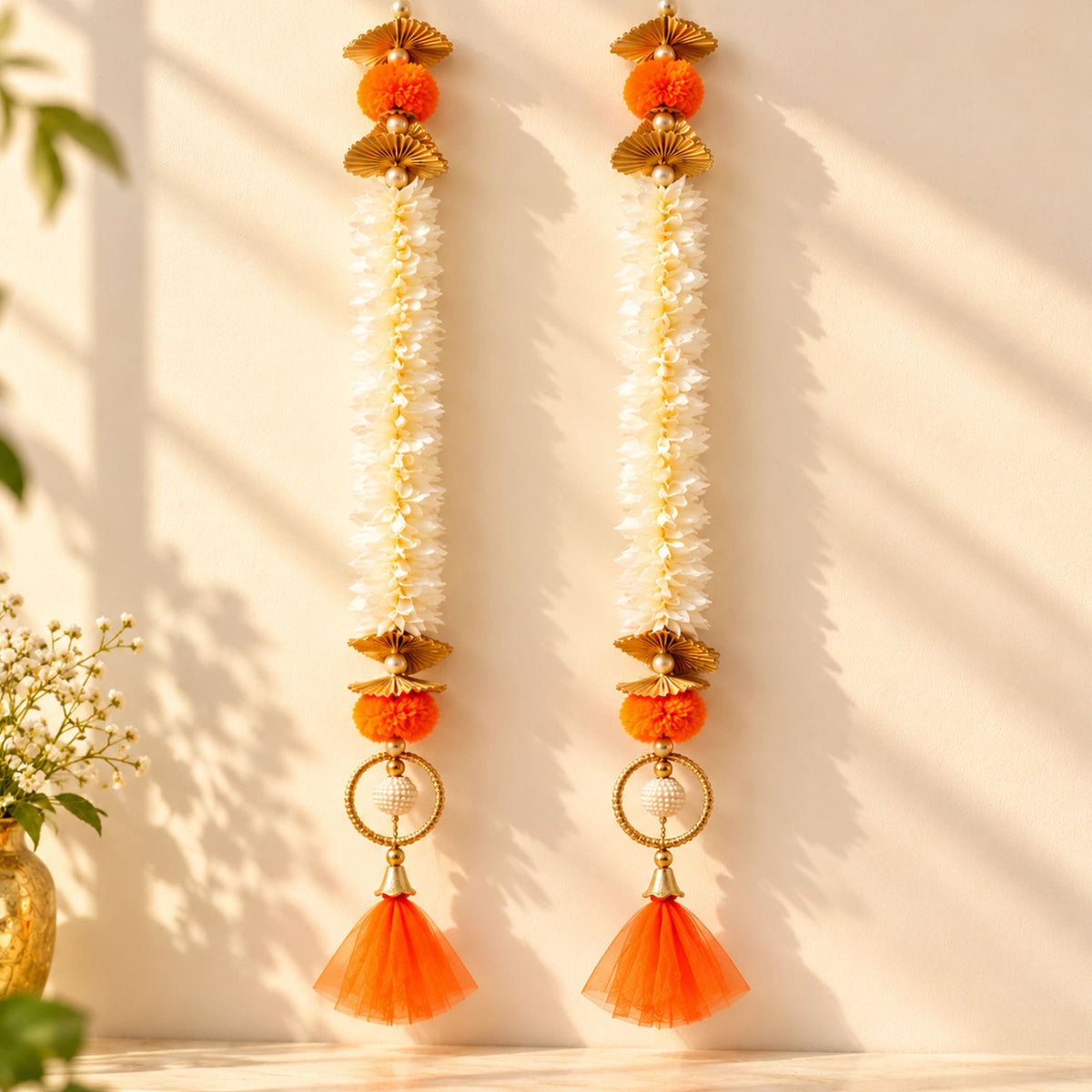 Bangle pom pom hanging backdrop garland with white artificial flowers gold metallic fans orange pom poms for festive decor