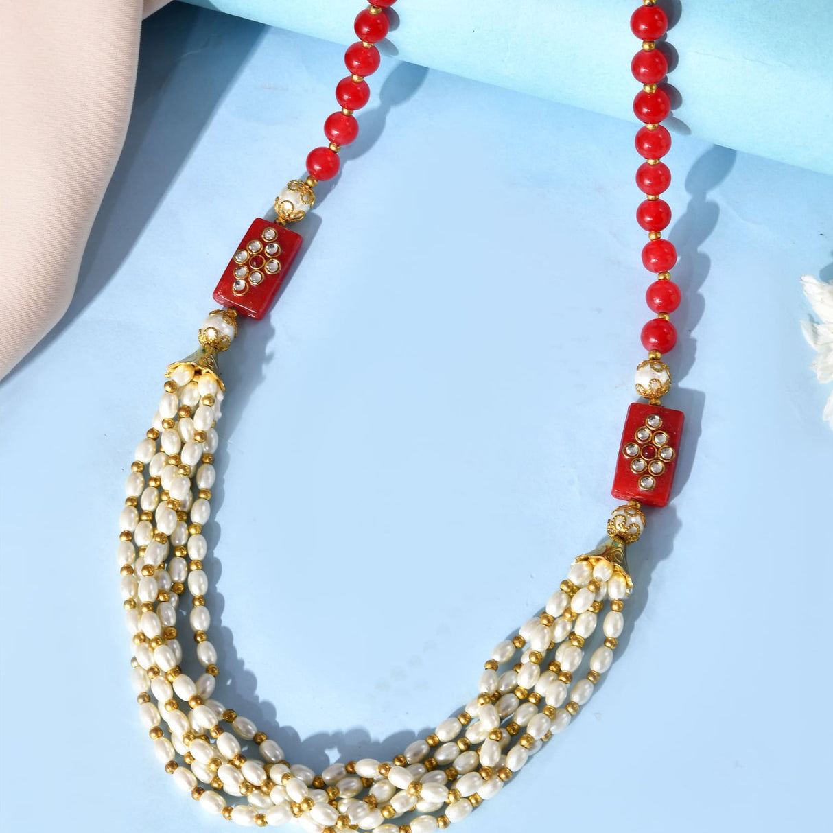 Pearl and red bead necklace with gold accents for wedding baraat
