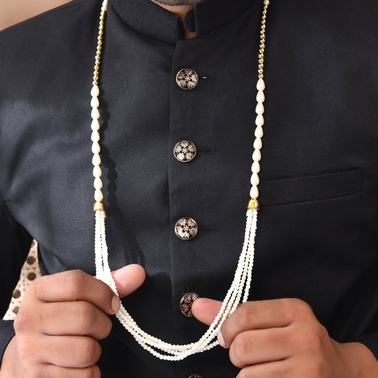 Handmade white pearl Barati Swagat Mala necklace with gold accents and tassel