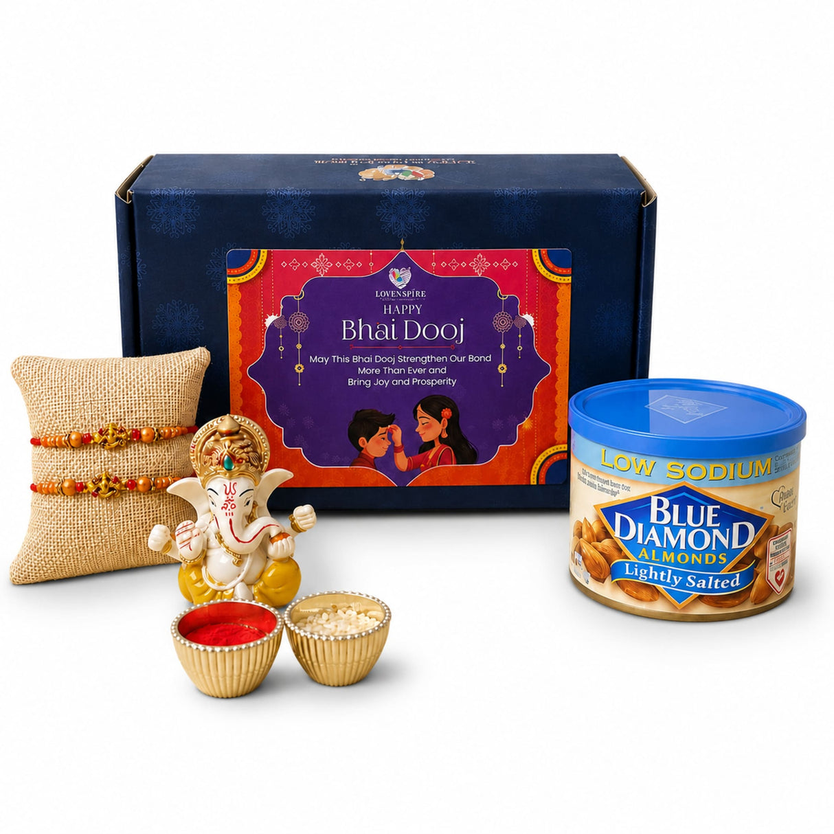 White and gold ganesha figurine with intricate detailing included in bhai dooj gift hamper for brother symbolizing good luck