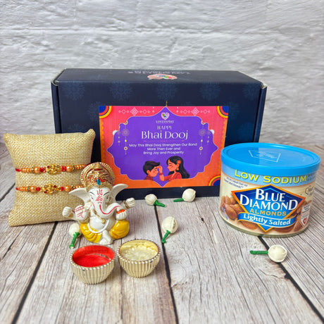 Bhai Dooj gift box with Rakhis Ganesha idol ceremonial items almonds for brother