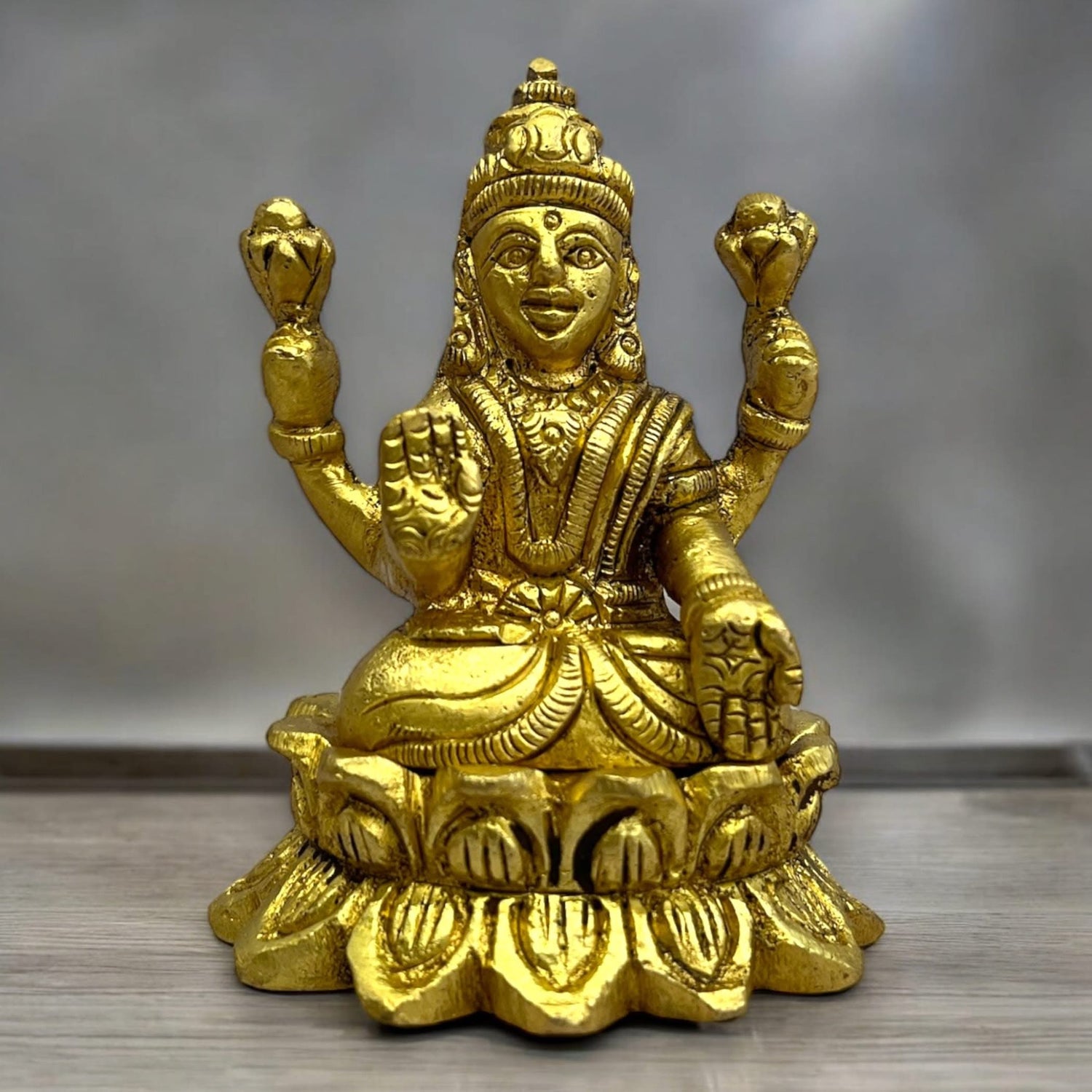 Golden Lakshmi statue for Diwali puja and home temple decor in a brass figurine