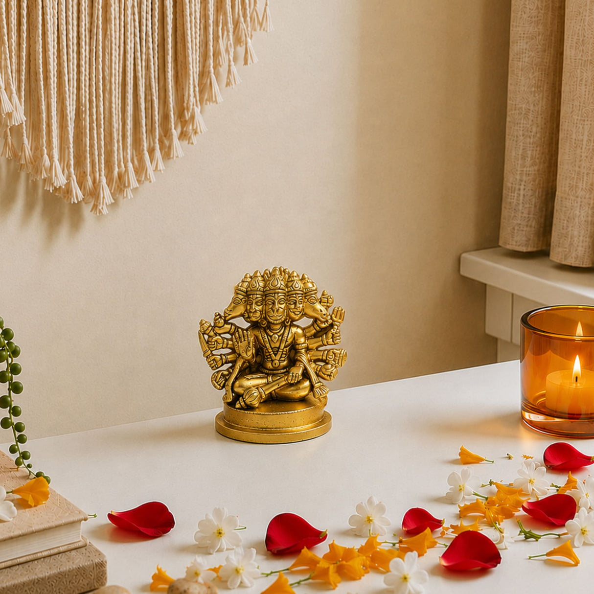 Golden brass panchmukhi hanuman statue with multiple heads and arms seated on an ornate circular base for pooja decor