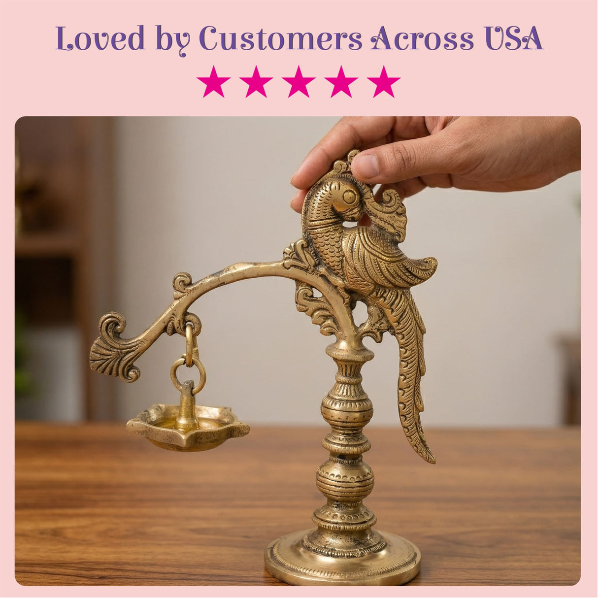 Golden brass bird-themed oil lamp with intricate carvings on a decorative stand for traditional diwali and temple use