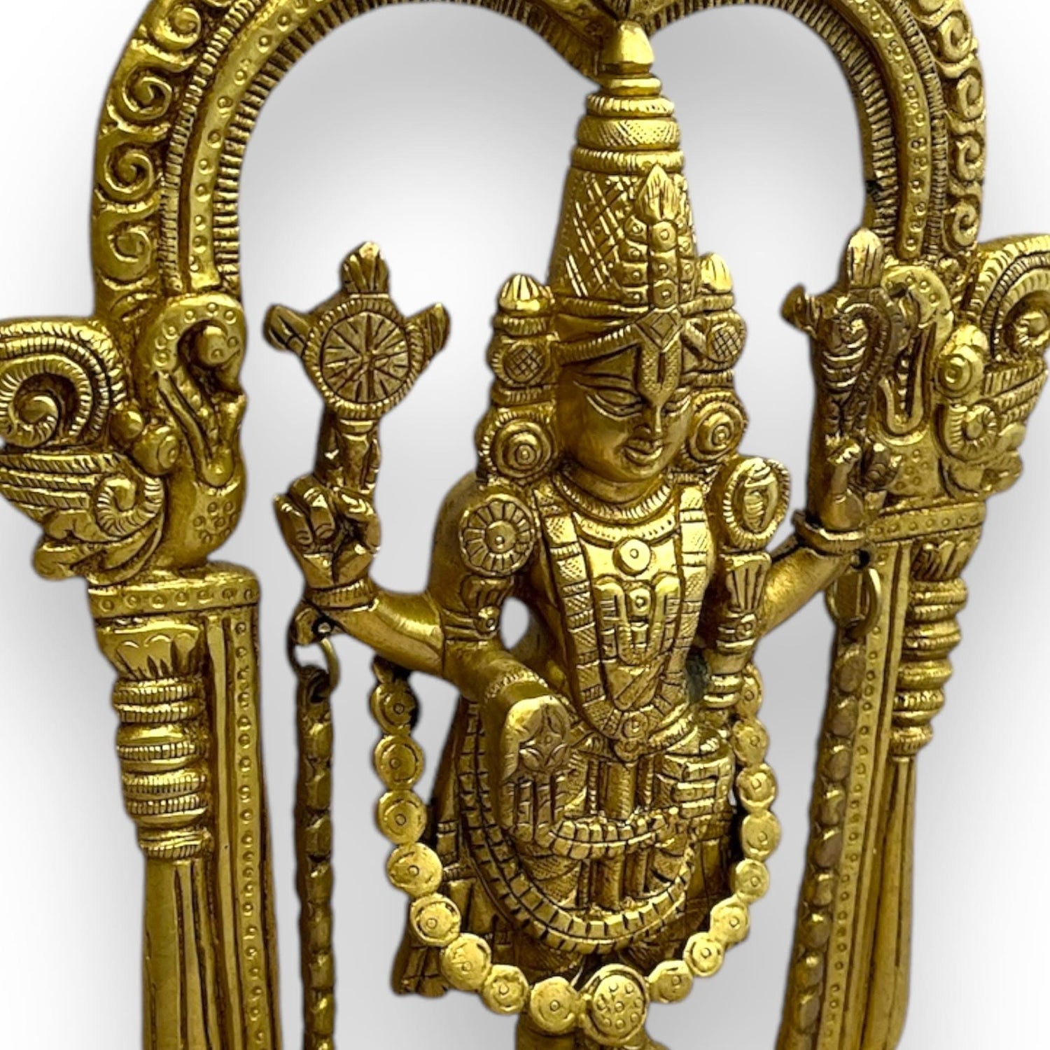 Ornate golden Hindu deity brass statue of Lord Vishnu for home altar or sacred decor