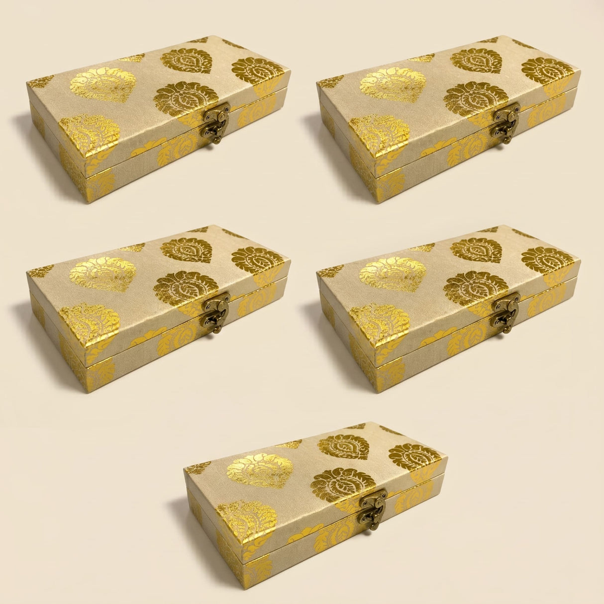 Beige brocade gift boxes with gold floral patterns and metallic clasps for indian muslim pakistani wedding favors