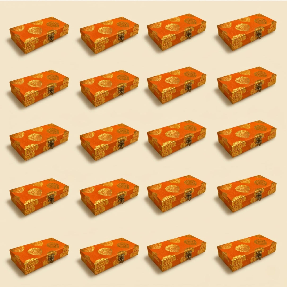 Orange brocade gift boxes with gold floral patterns and metal clasps for indian muslim pakistani wedding favors