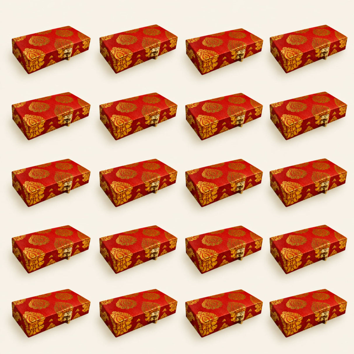 Red rectangular brocade jewelry boxes with gold floral patterns and brass clasps for indian wedding favors