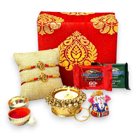 Elegant Brocade Rakhi Gift Set with Candles Chocolates and Roli Chawal for Rakshabandhan