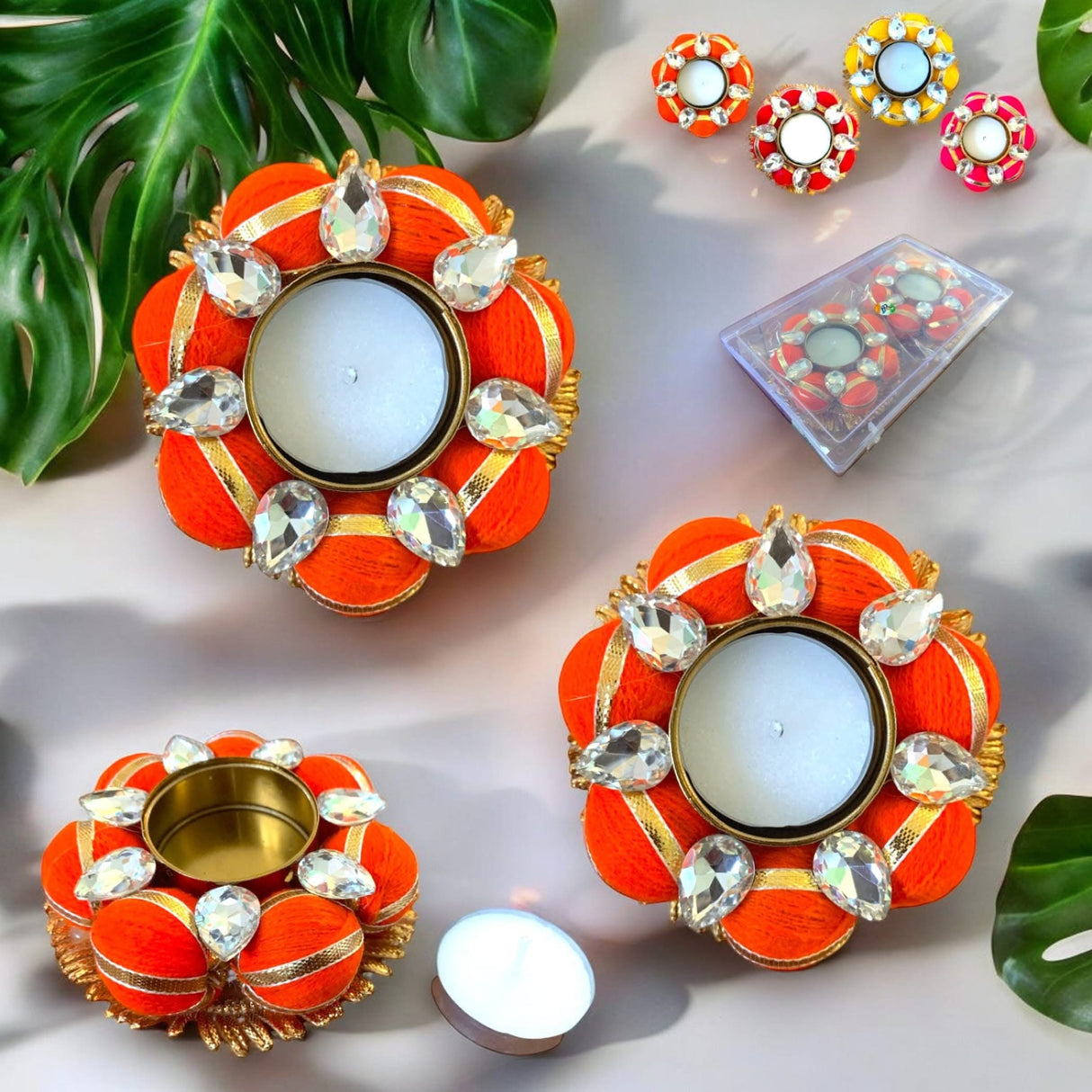 Orange jeweled candle holders for tea light centerpiece decor and festive occasions