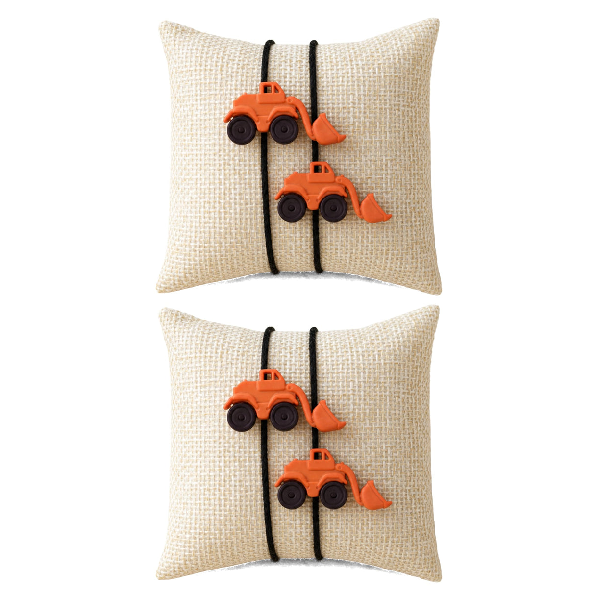 Beige textured cushion with two orange plastic excavator toys attached with black elastic bands in cartoon rakhi set