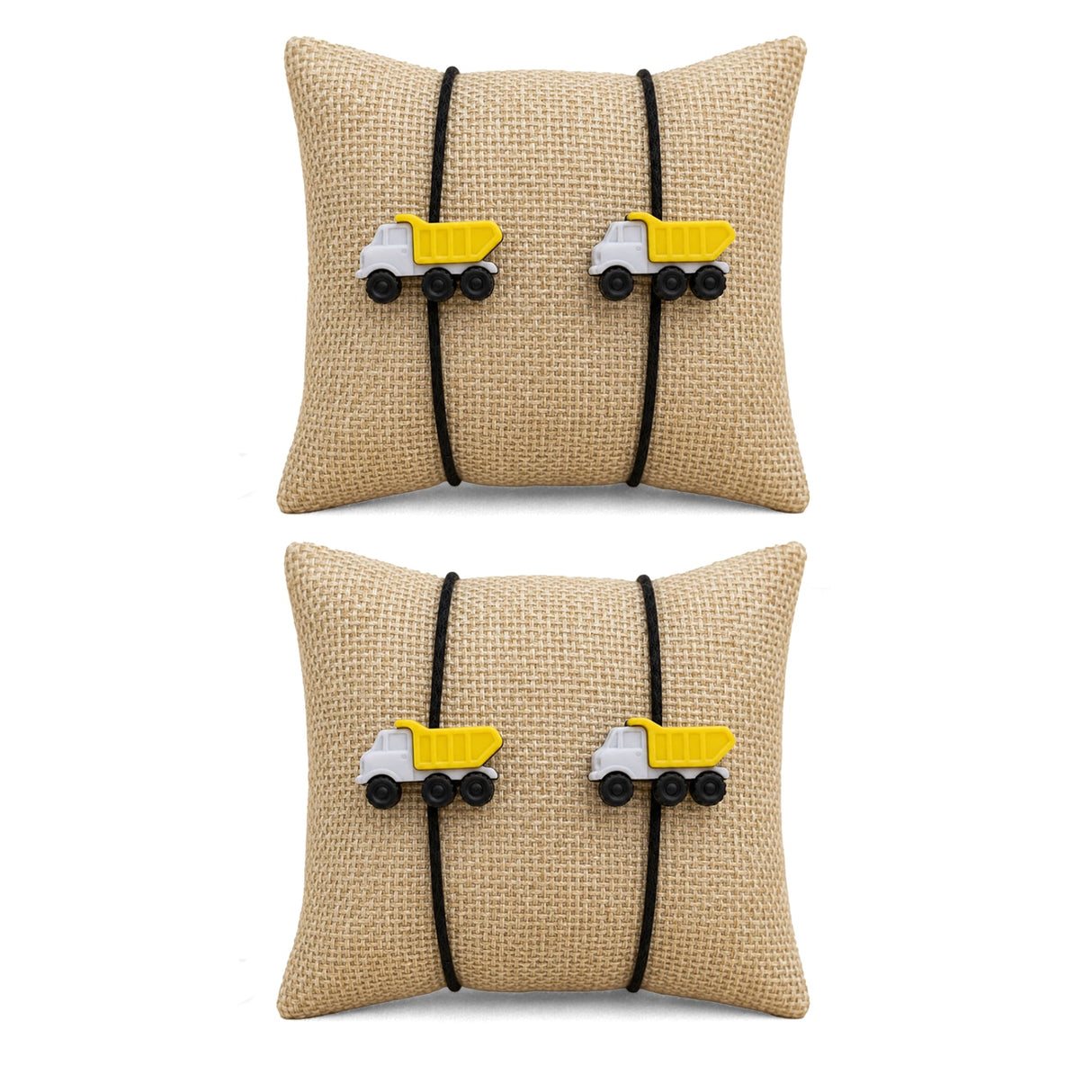 Beige woven fabric square pillow with black elastic bands and yellow dump truck charms for cartoon rakhi gift set