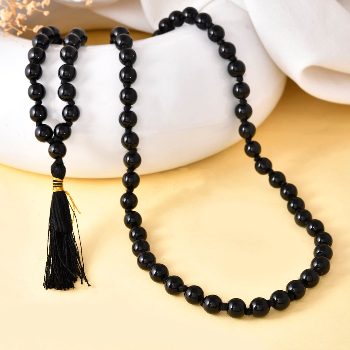 Black beaded necklace with tassel from 108 Mala Beads Natural Healing Crystal Chakra Jewelry