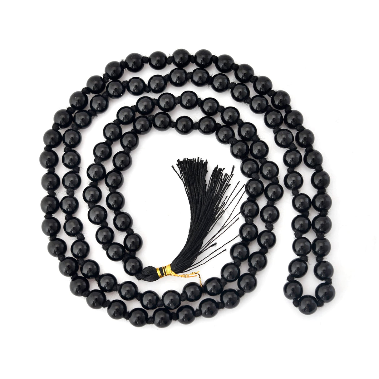 Black beaded mala necklace with tassel for meditation, healing, and spiritual practice