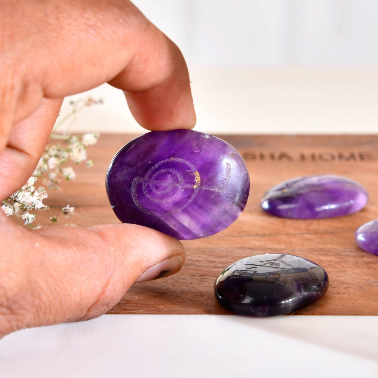 Polished purple Amethyst palm stone from Crystal Reiki Stones Chakra Balancing Kit