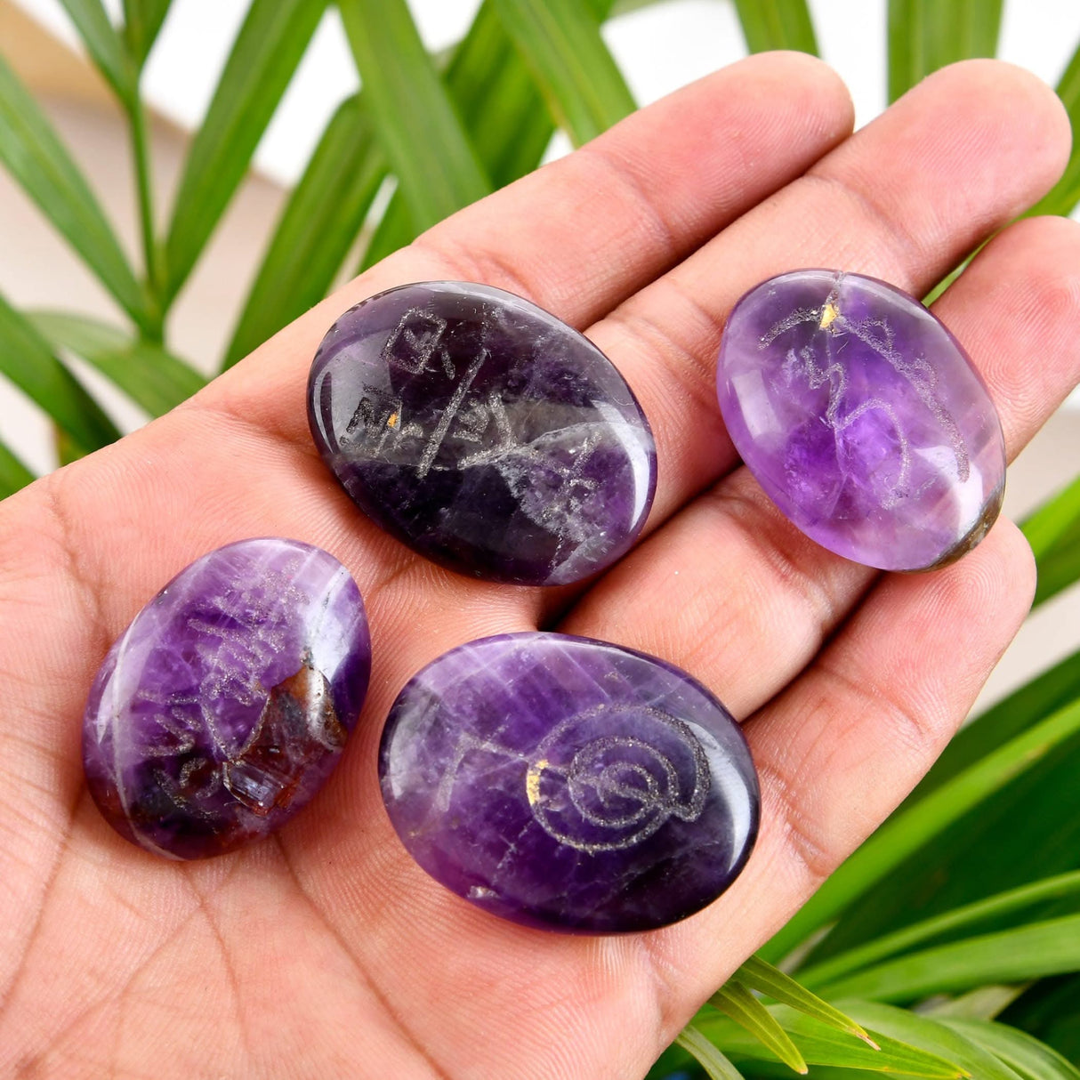 Polished amethyst stones from Chakra Balancing Kit for meditation and healing purposes