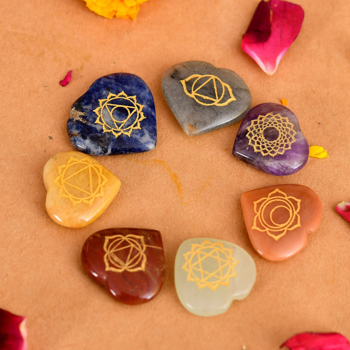 Heart-shaped chakra stones from Crystal Reiki Stones set for meditation and healing