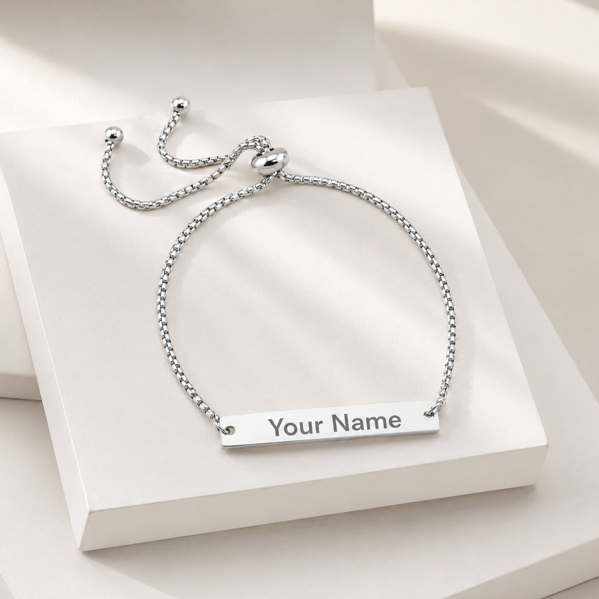 Silver stainless steel adjustable bracelet with sleek rectangular engraved nameplate and box chain design for personalized gifts