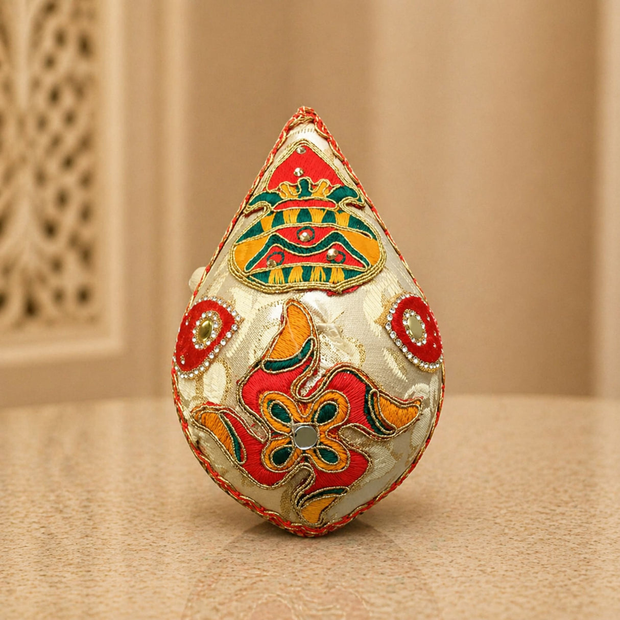 Shriphal mangal kalash decorated coconut with silver teardrop pouch embroidered in red green gold for wedding pooja