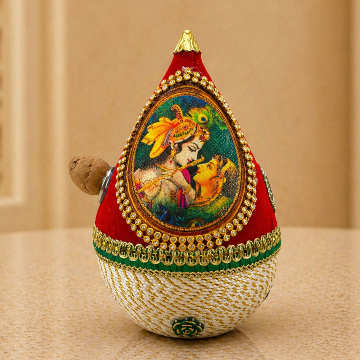 Red and cream embroidered teardrop decorative coconut with gold bead trim green lace and radha-krishna painting for wedding pooja