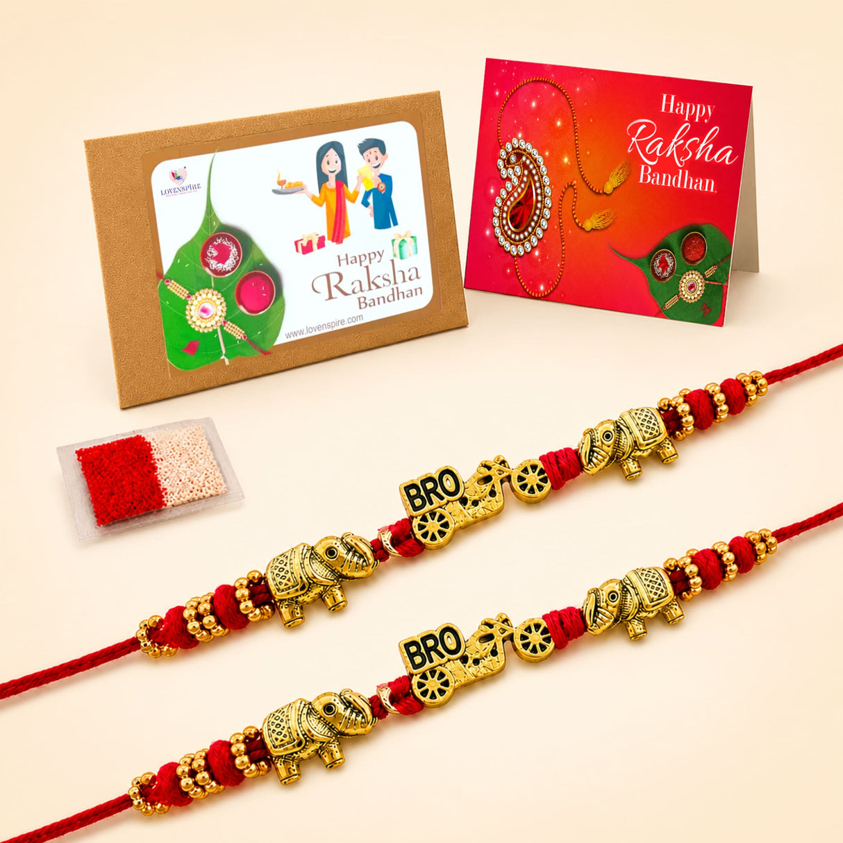 Gold-colored elephant-themed rakhi with red thread and bro charm from 2pc designer rakhi bracelet gift set for brother