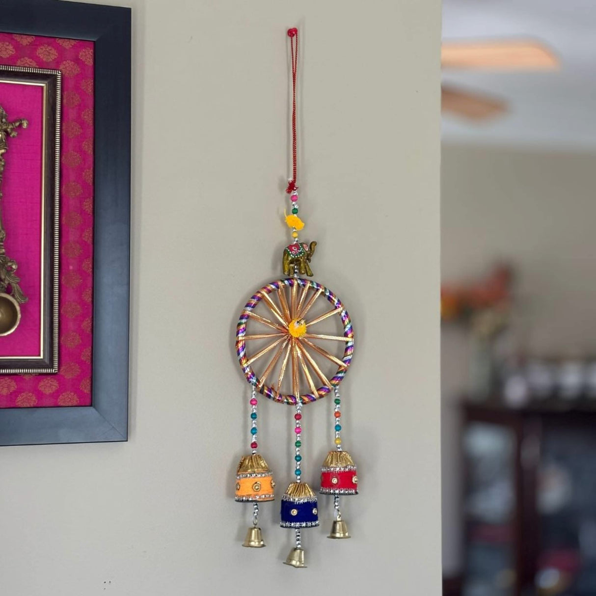 Colorful decorative wall hanging with bells from Diwali Gift Hamper Indian Festival collection