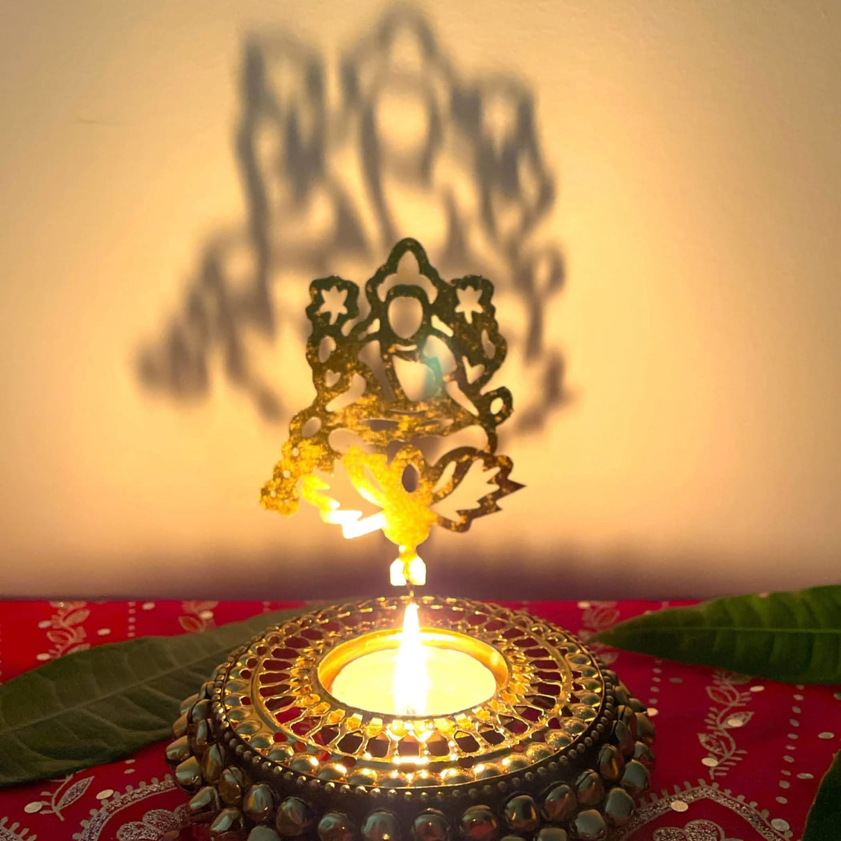 Ornate candle holder featuring shadow art from Diwali Gift Hamper product image