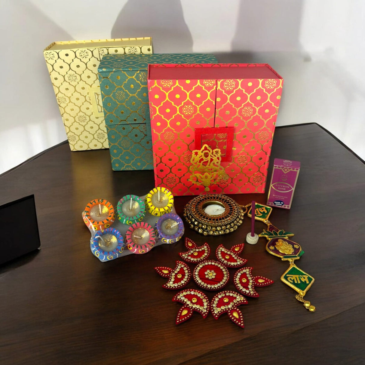 Festive Diwali decorations with gift boxes and clay diya shadows for Indian celebration