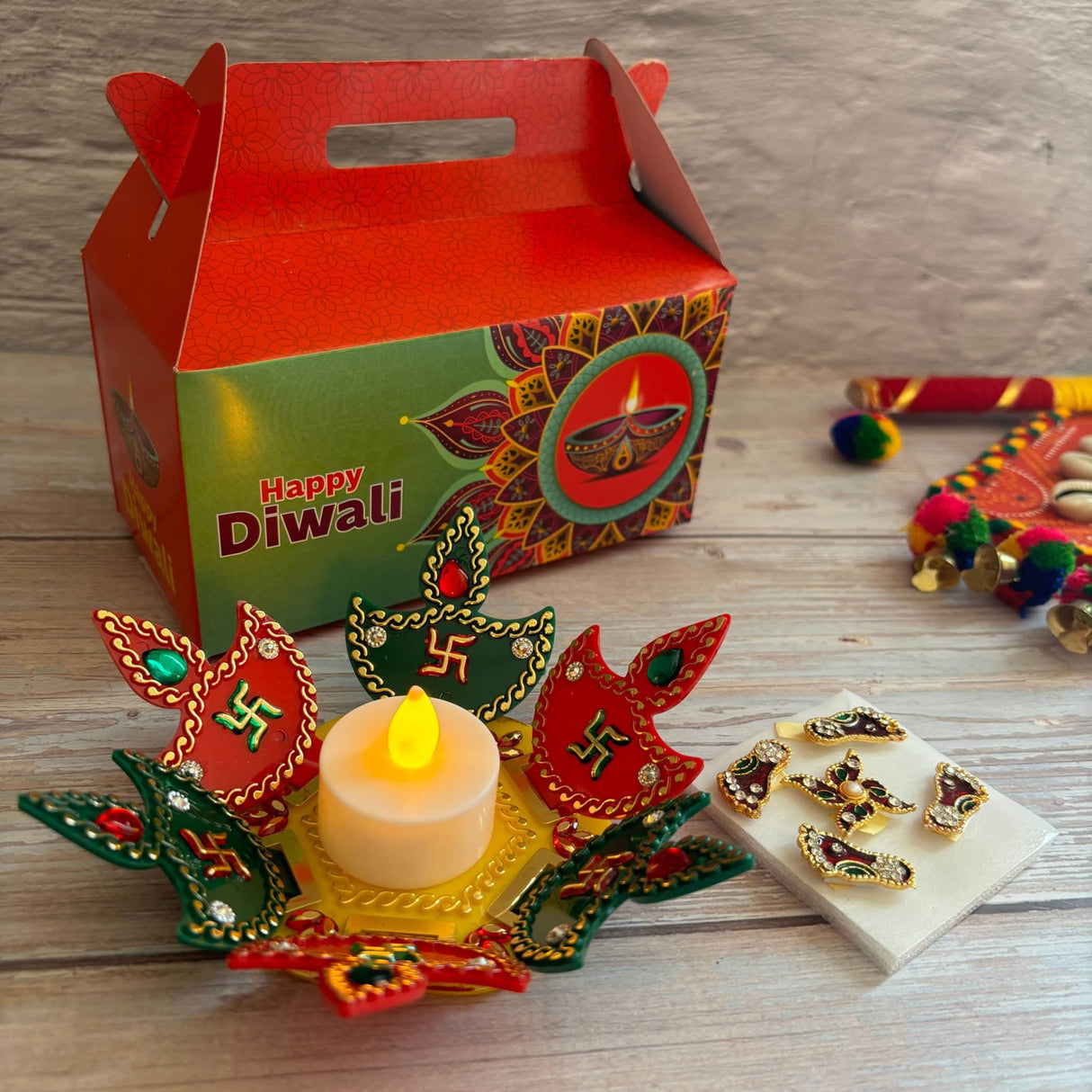 Diwali gift set in a gable box with acrylic Rangoli and Lakshmi Feet for festival celebrations
