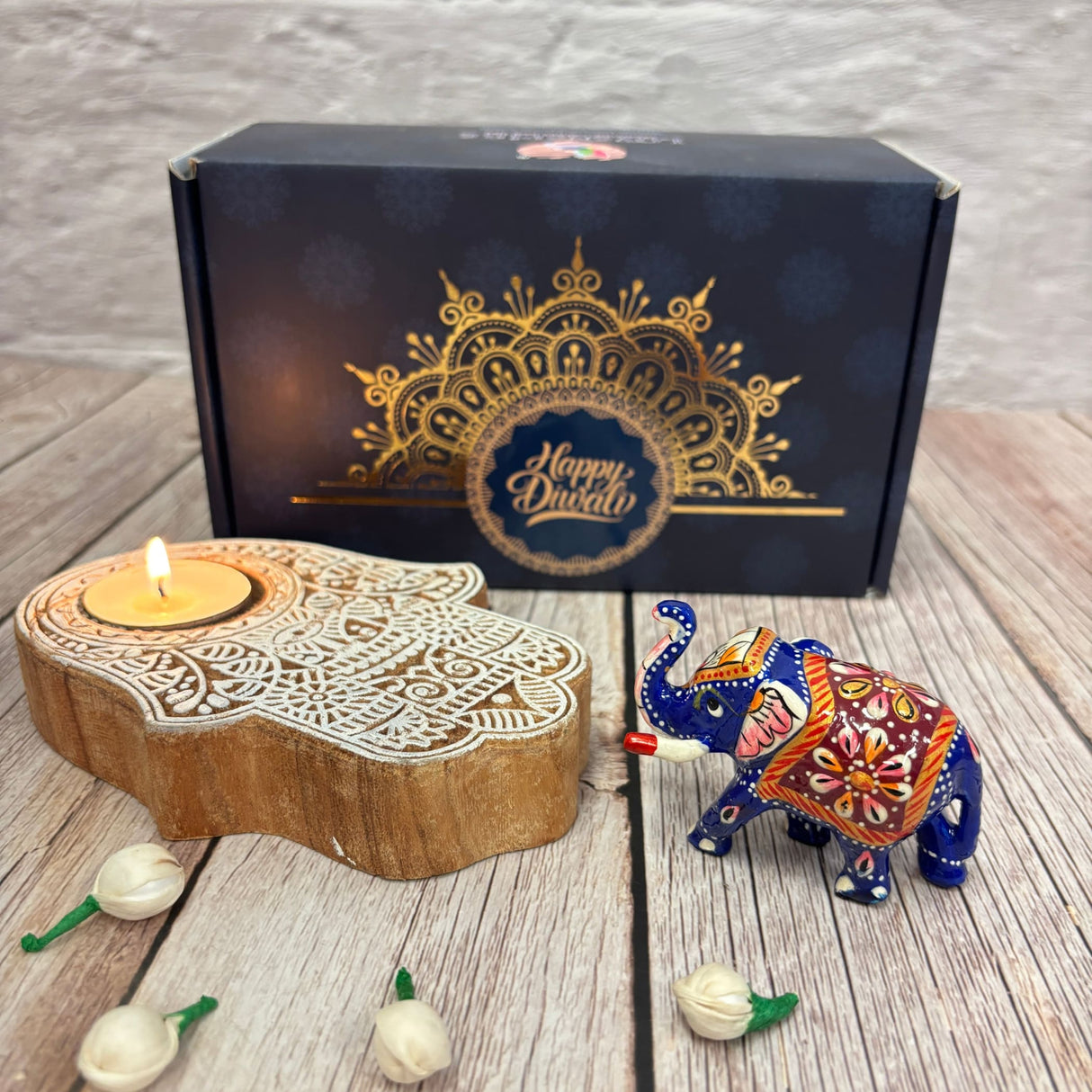 Dark blue gift box with gold and blue Happy Diwali design for Diwali hampers