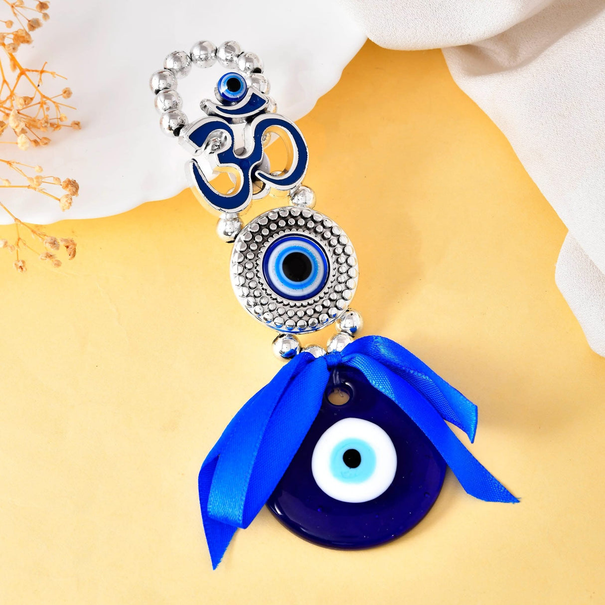 Blue and silver Om evil eye charm hanging ornament for good luck and decor