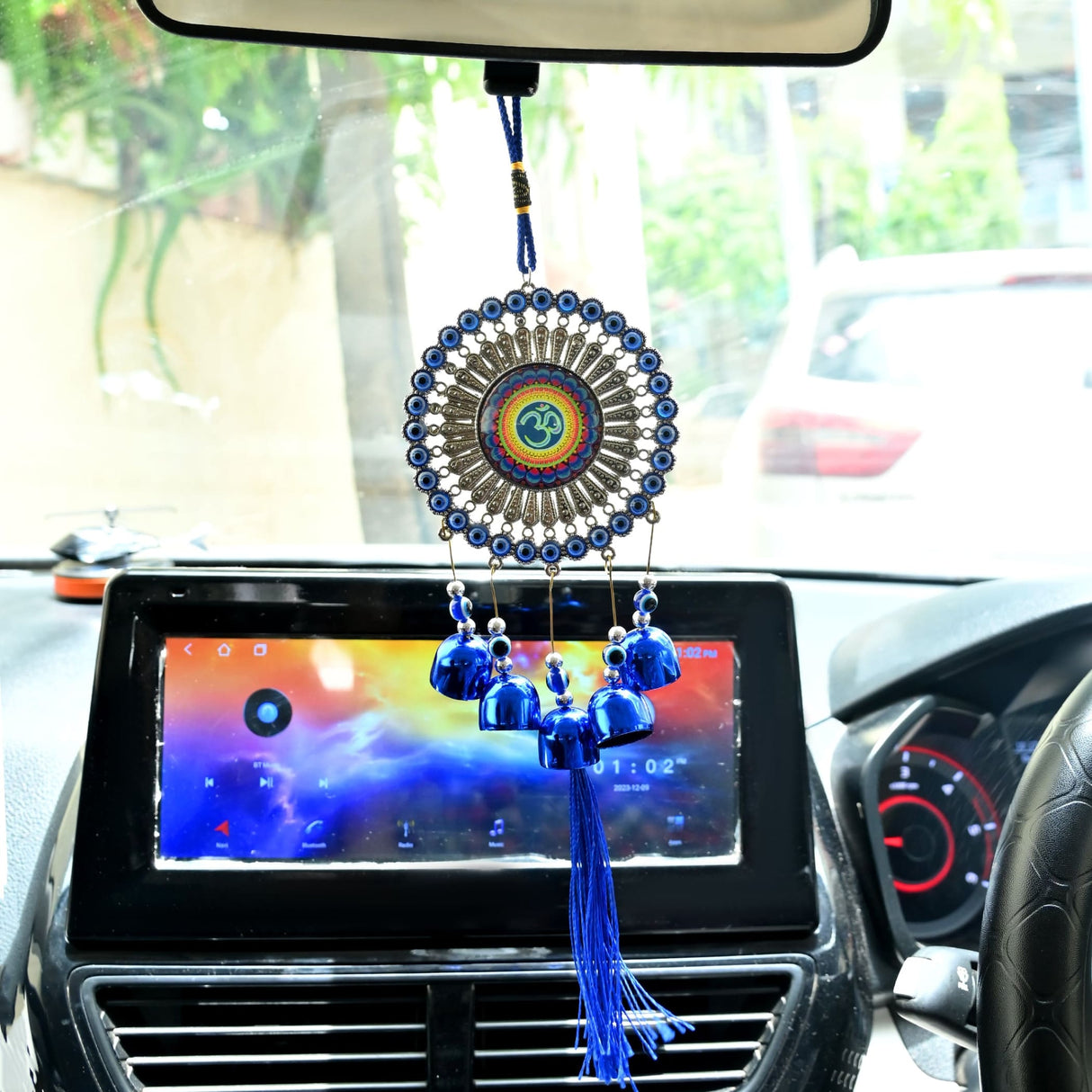 Bohemian evil eye dreamcatcher car hanging with blue tassels and OM beads